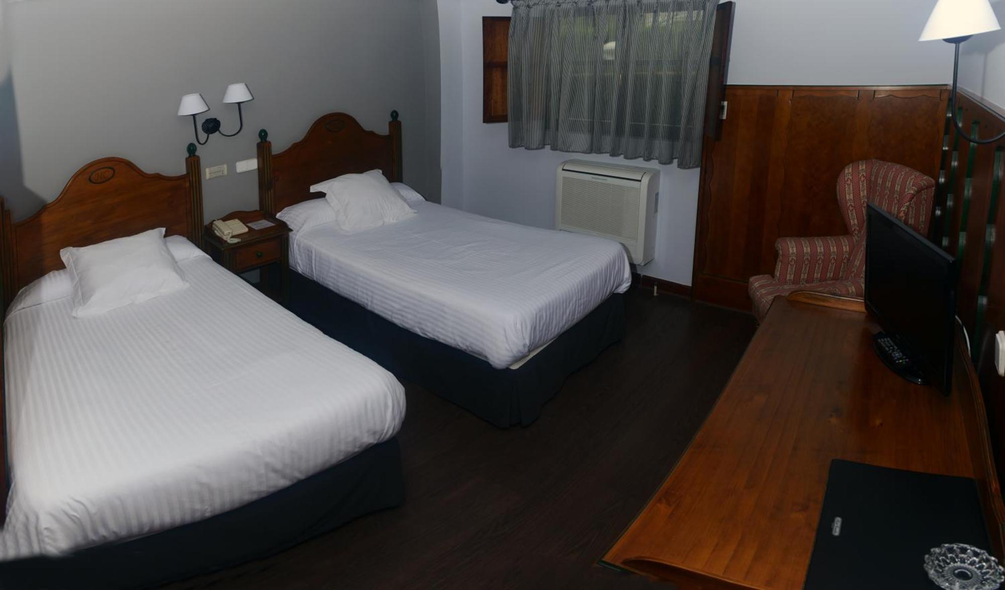 Hotel Comillas Quarto foto